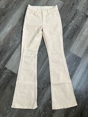 MOTHER  The Weekender Sneak Flare Jeans in frozen dew